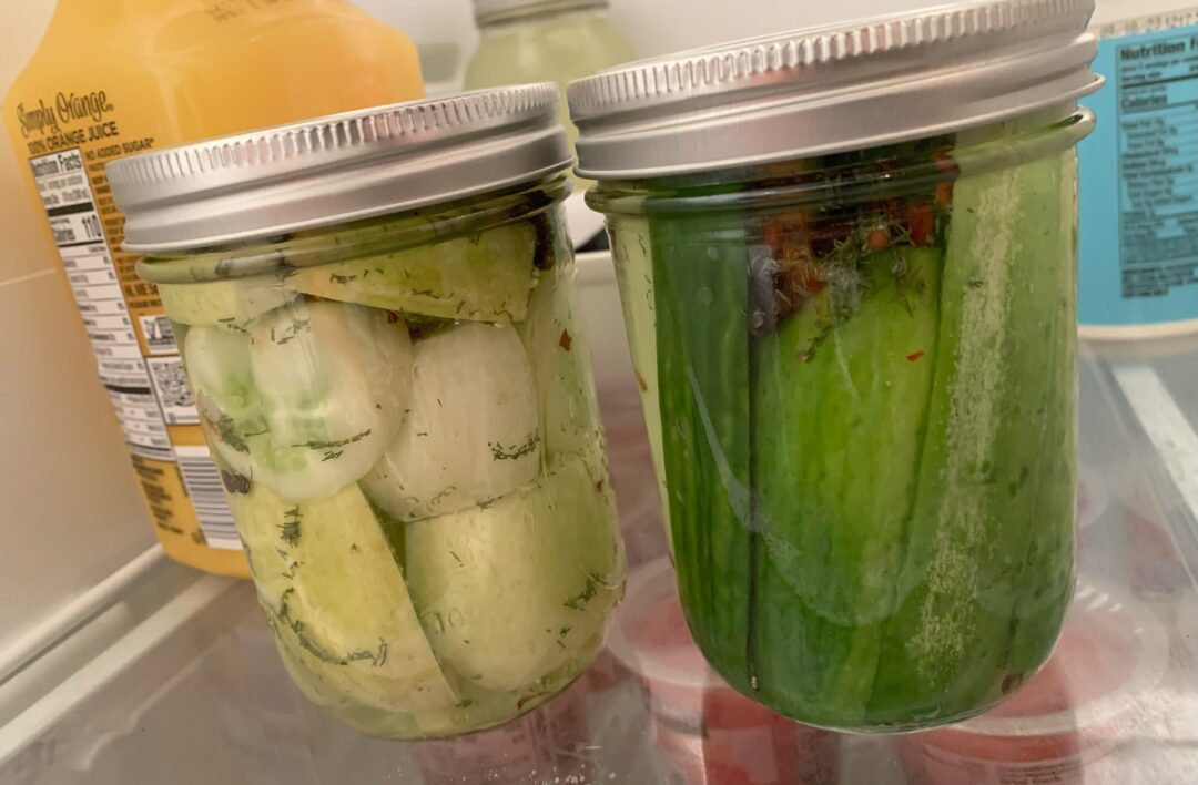 Two jars of homemade pickles.