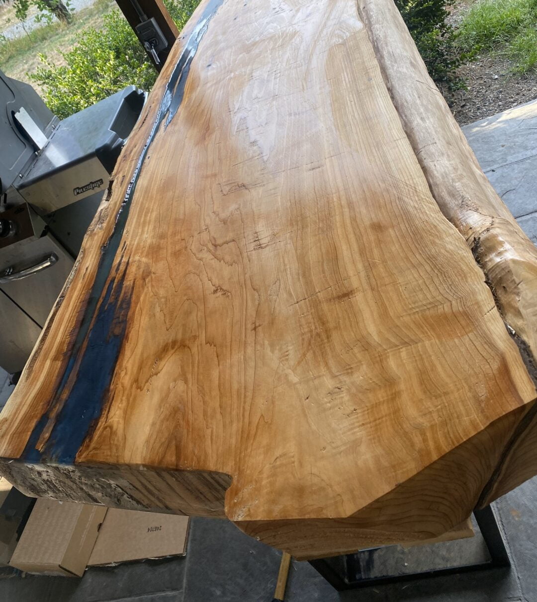 A hand-made, live-edge wooden table.